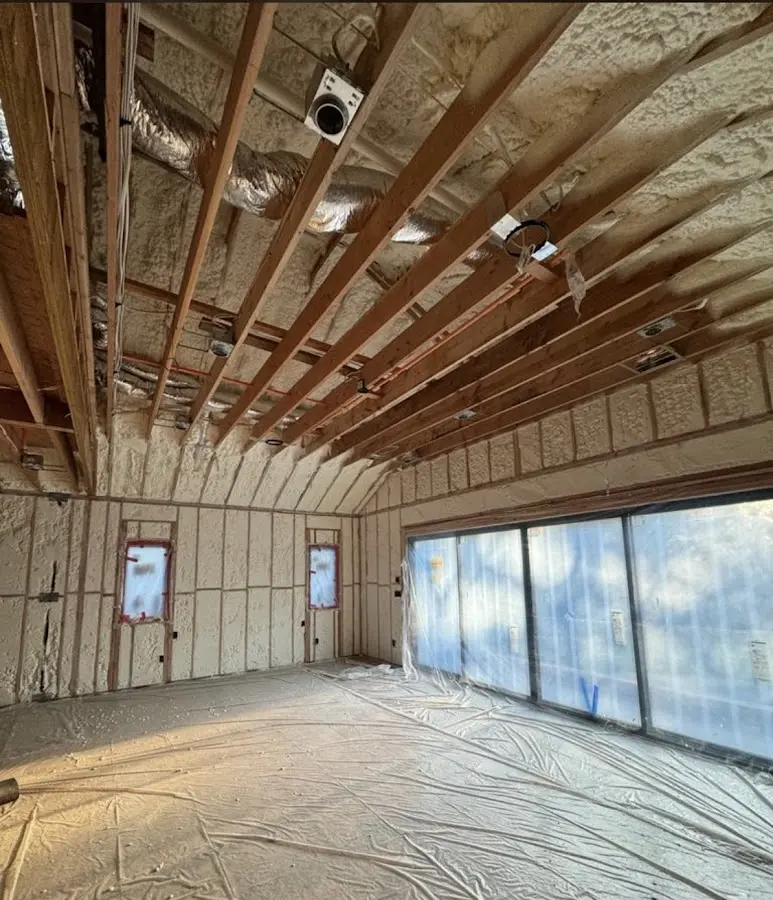 Interior walls and ceiling insulated with spray foam during new construction in Grass Valley